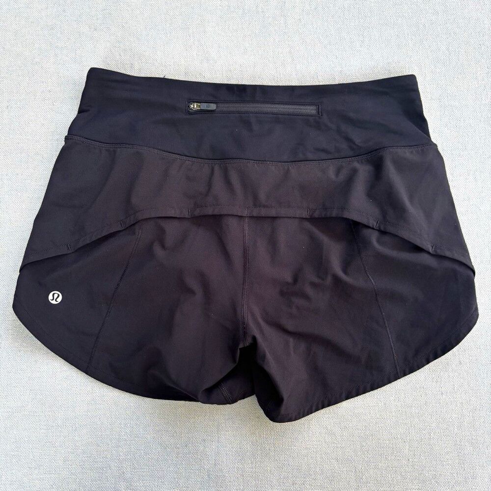 Lululemon Women’s Black Solid Athletic Running Shorts Zip Pockets Stretch Size 4